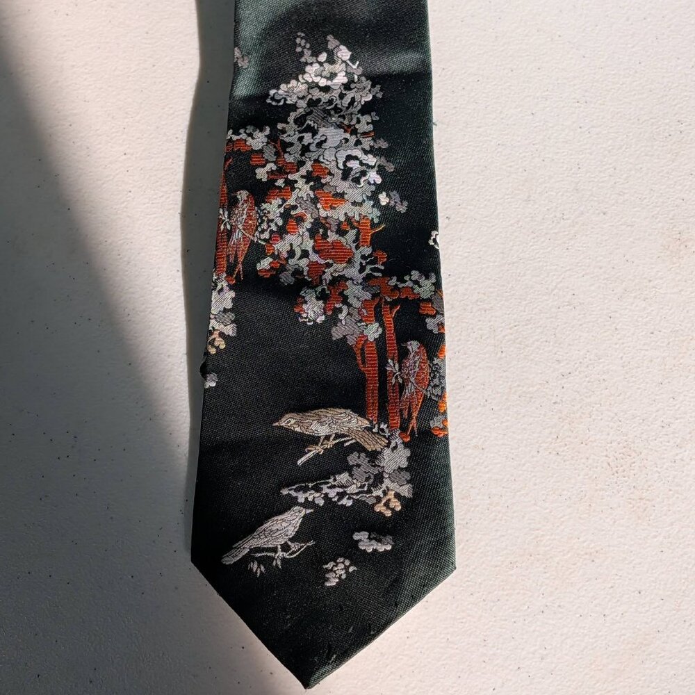 Vintage 1970's Jacquard Woven Polyester Kipper Tie Featuring A Bird & Tree Scene